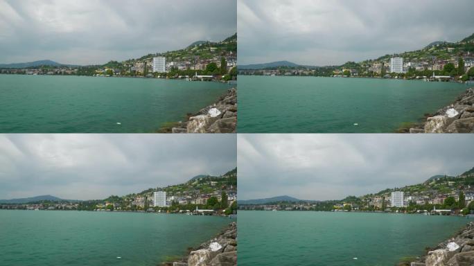 晴天蒙特勒市著名的日内瓦湖湾慢动作全景4k瑞士