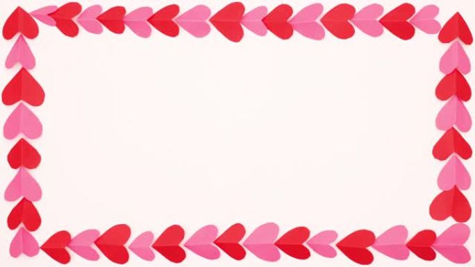 情人节框架，红色和粉红色的心，空的文字停止运动空间