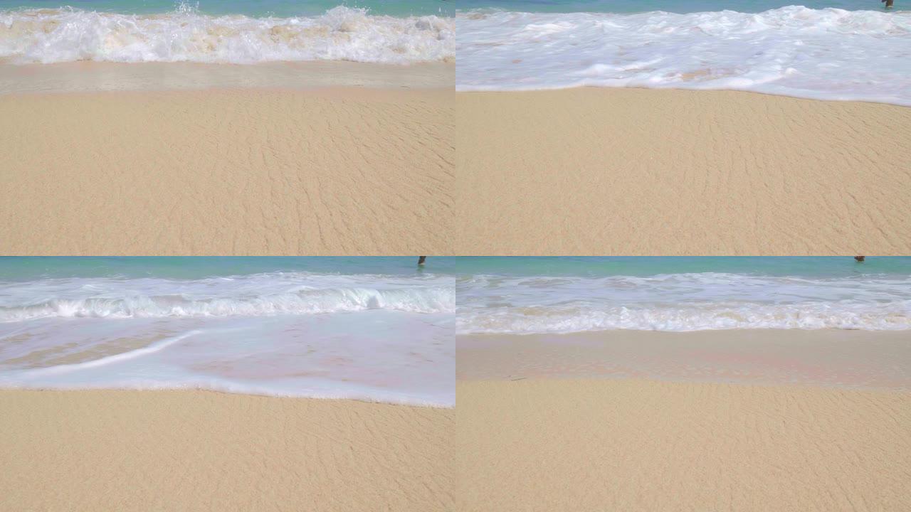 热带海滩上有大浪的湿沙