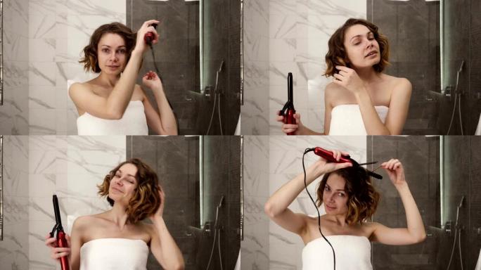 一个年轻女子的肖像，在一个大的白色浴巾造型她的头发卷发在镜子前。一个女孩洗完澡后在浴室里做发型。前视