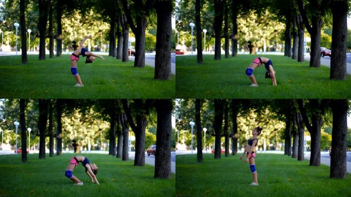 一个阳光明媚的夏日，在城市公园的草地上练习桥式体操锻炼，七年来穿着运动服的美丽白人女孩。慢动作