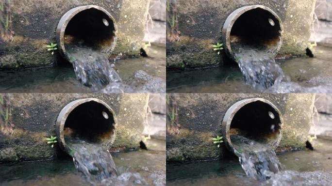 街道上的排水或污水人孔网格系统，具有4次慢动作。