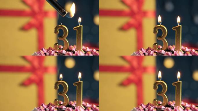 生日蛋糕编号31点灯燃烧的金色蜡烛，蓝色背景礼物黄色盒子用红丝带绑起来。特写和慢动作