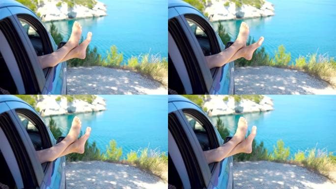 从车窗背景海显示小女孩脚的特写