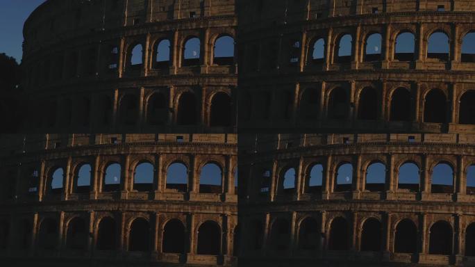 体育馆。罗马的历史建筑。透过拱门你可以看到月亮。