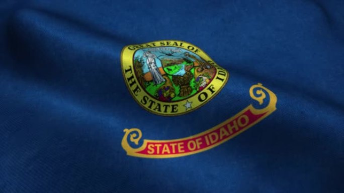 爱达荷州的旗帜在风中飘扬。爱达荷州国旗。爱达荷州的标志无缝循环动画。4 k