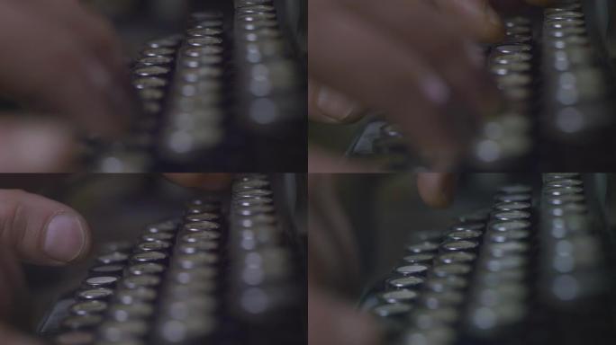 特写镜头一个男人的手在一台老式复古打字机上打字。俄语字母表。背光新闻。电影4k视频