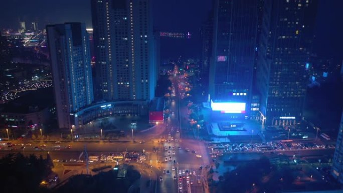 夜景照明青岛市市中心交通街十字路口湾空中全景4k中国