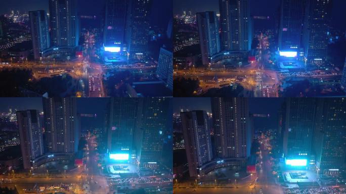 夜景照明青岛市市中心交通街十字路口湾空中全景4k中国