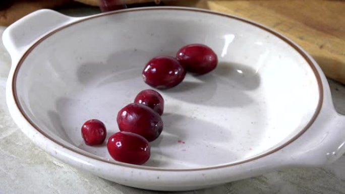 Pouring cranberries into a ball