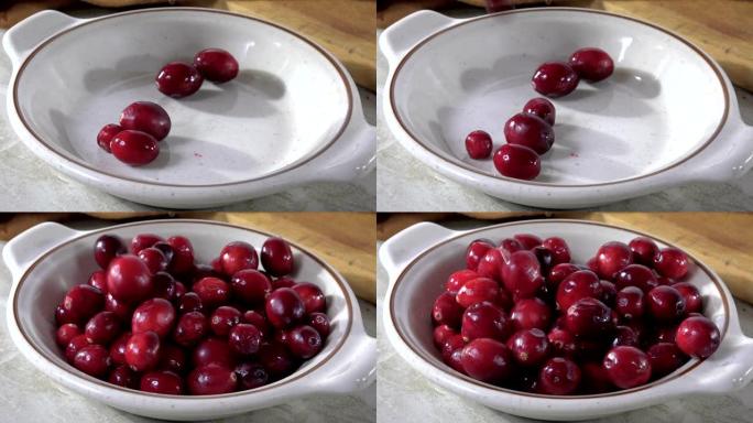 Pouring cranberries into a ball