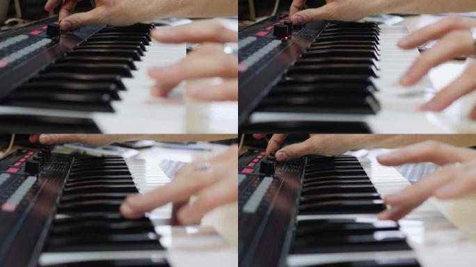 音乐家在键盘合成器钢琴按键上演奏