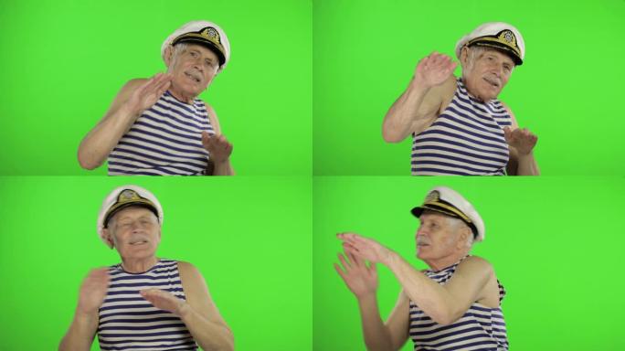 老年水手有趣的舞蹈。色度关键背景上的老水手