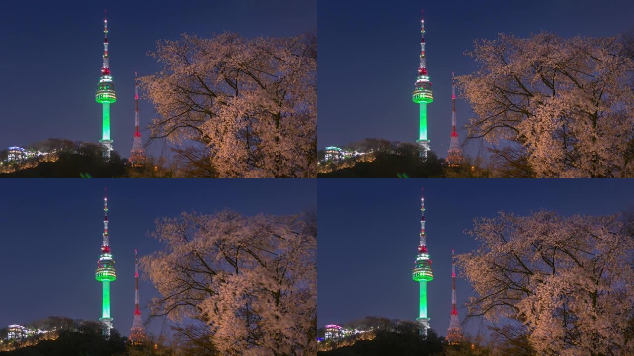 首尔塔在春天的夜晚，樱花树盛开，韩国。4k延时