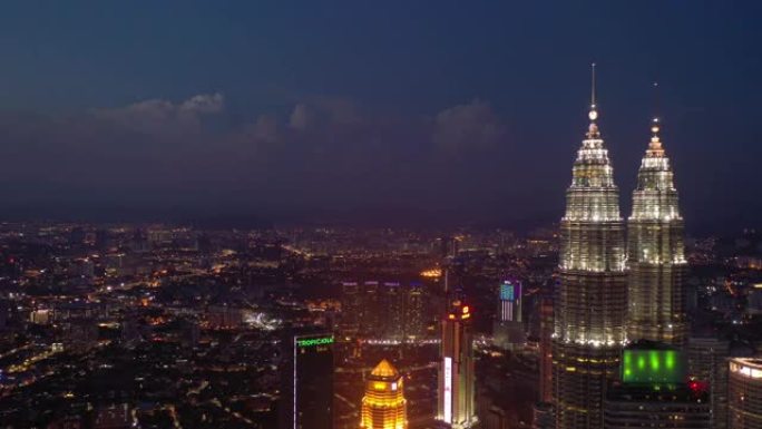 吉隆坡夜晚华丽的天空照亮市中心航空全景4k马来西亚