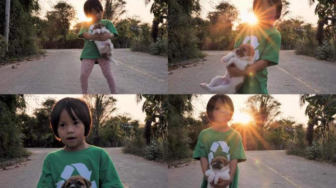 小女孩背着小狗在路上跳舞