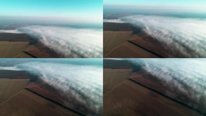 鸟瞰图。自然和云景。雾和雾将景观分为两个世界，在景观中创造简约和美丽。
