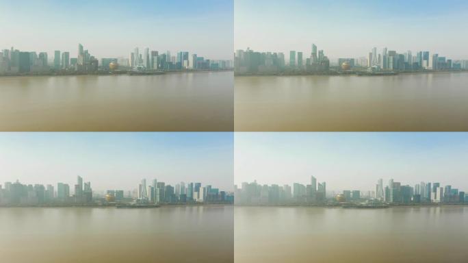 阳光明媚的日子杭州市中心景观滨河湾空中延时全景4k中国