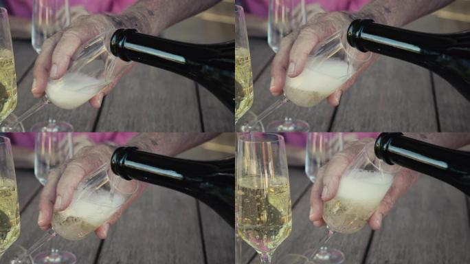 Pouring Champagne close up with pan
