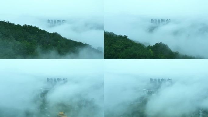 唯美意境的山顶雨雾城镇4K航拍
