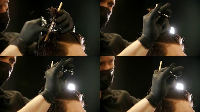理发师戴着手套剪客户的湿头发-剪主要长度