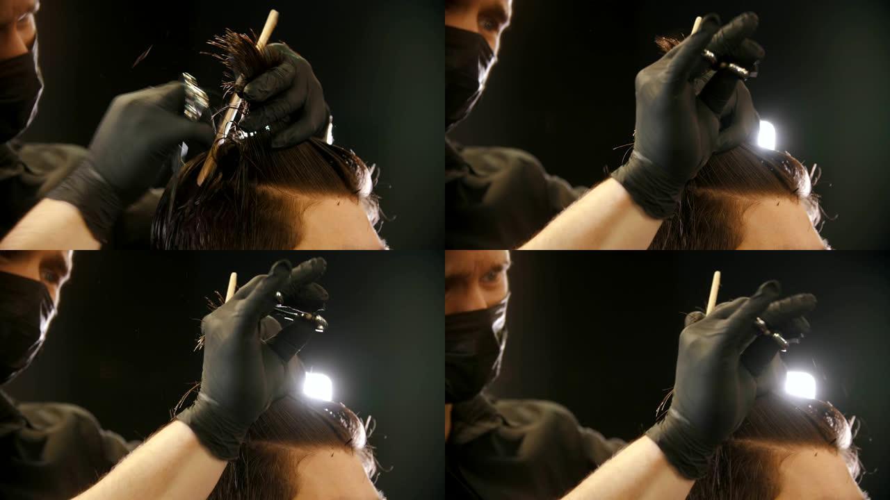 理发师戴着手套剪客户的湿头发-剪主要长度