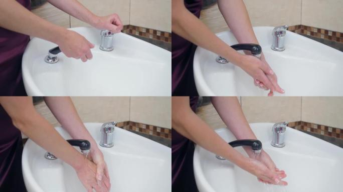 造型师在白色的盥洗台上洗手，近距离拍摄。剃须前洗手，记录在美发沙龙。