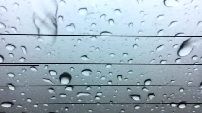 雨水落在窗户上视觉创意视频素材玻璃沾水