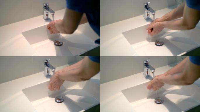 女人在4k慢动作60fps的故障水龙头在流水下洗手