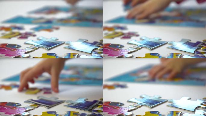 一个五岁小女孩在家收集拼图的特写镜头。