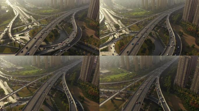 飞行超过日落时间光杭州交通街道道路交汇处城市景观建设航拍全景4k中国