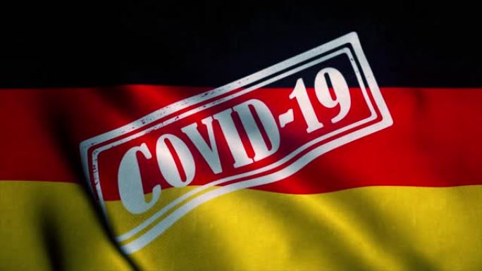 德国国旗上印有Covid-19标志。冠状病毒的概念