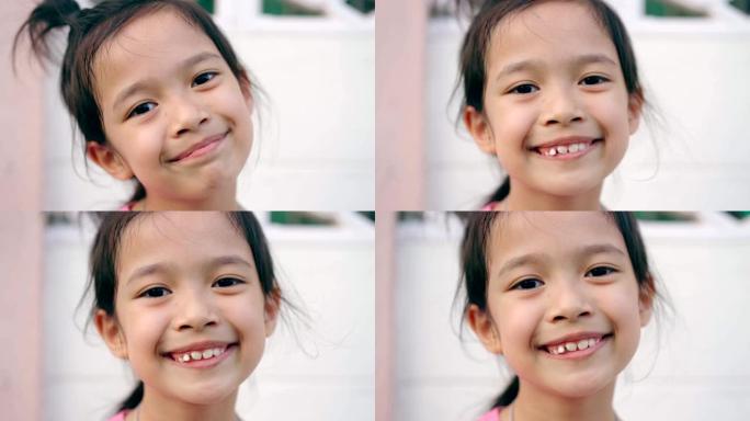 特写亚洲小女孩微笑。8岁的女孩。