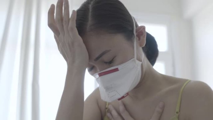 亚洲妇女戴口罩隔离新冠肺炎