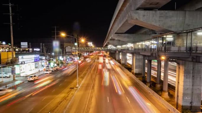 泰国曼谷kanchanaphisek路夜间高峰时段，超级高速公路上的长时间暴露夜间交通堵塞。