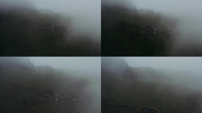 这个村庄布满了晨雾。霍比特人之家