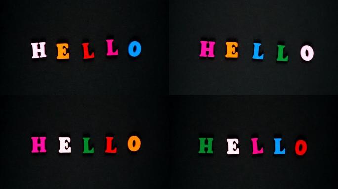 单词hello由木制五彩字母组成。五颜六色的单词循环。停止运动动画