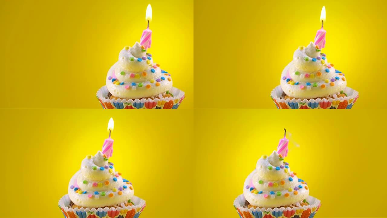 生日装饰纸杯蛋糕，配有蜡烛和洒水 -- 滑动镜头