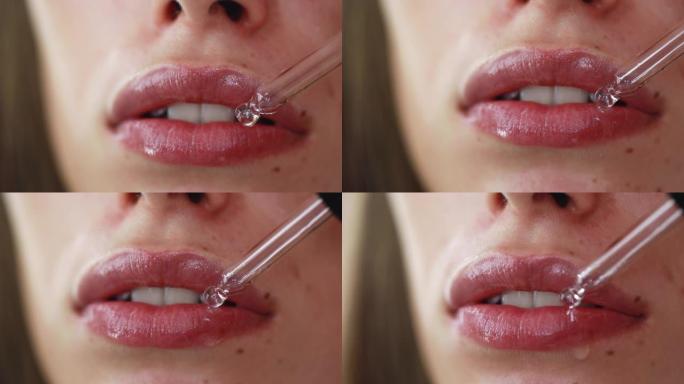 女人涂上唇彩的极端特写视频
