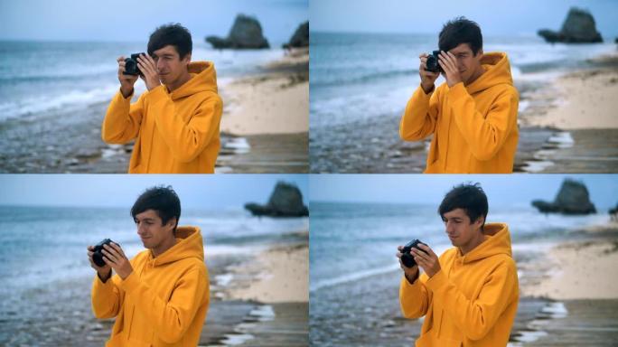 自然摄影师在美丽的热带海滩拍摄日落时的海浪。男性旅行者摄影师为博客制作专业图片。