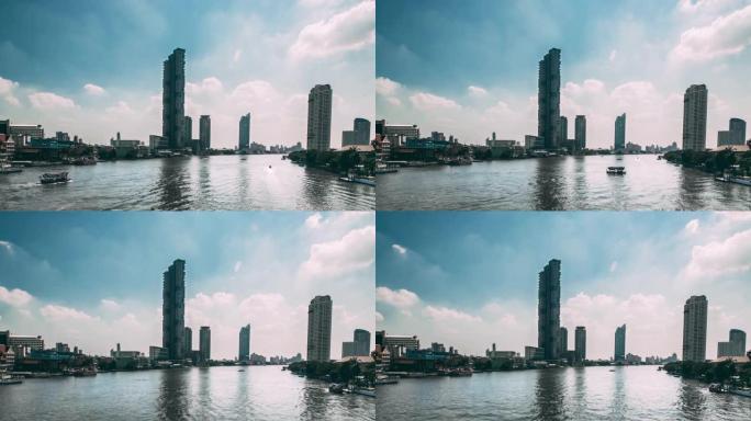曼谷市中心塔克辛大桥和湄南河的船只延时视图。泰国。智慧城市中的金融区。摩天大楼和高层建筑在下午
