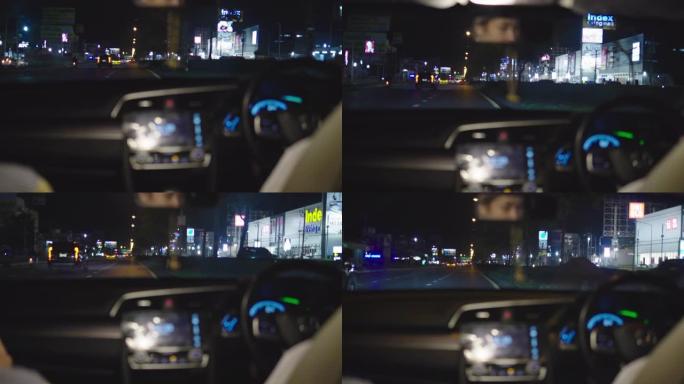 曼谷夜间开车的幸福女人