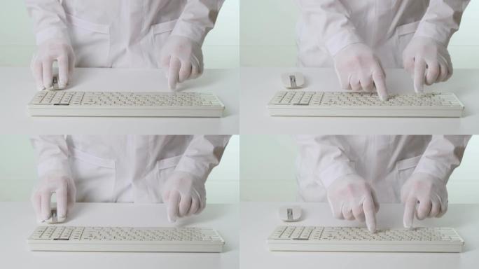 戴着白手套的手在键盘上打字。