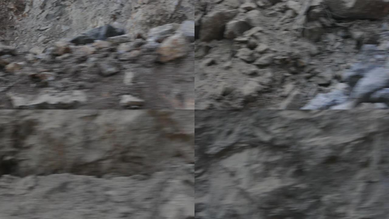 右侧驱动板经过岩石和砾石场地