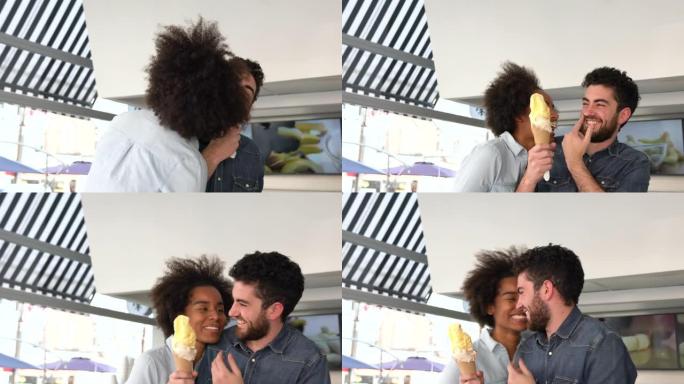恋爱中的美丽拉丁美洲夫妇，在icre cream商店享用冰淇淋