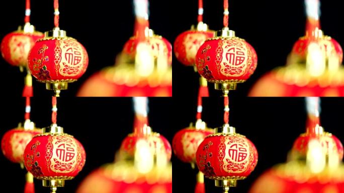 中国城镇黑色背景上的中国灯笼。2020年农历新年老鼠十二生肖。中文翻译: 新年快乐