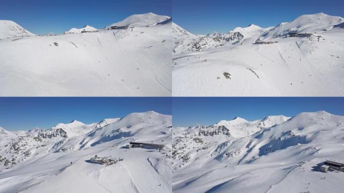 奥地利萨尔茨堡地Obertauern滑雪胜地滑雪场上滑雪者的鸟瞰图。