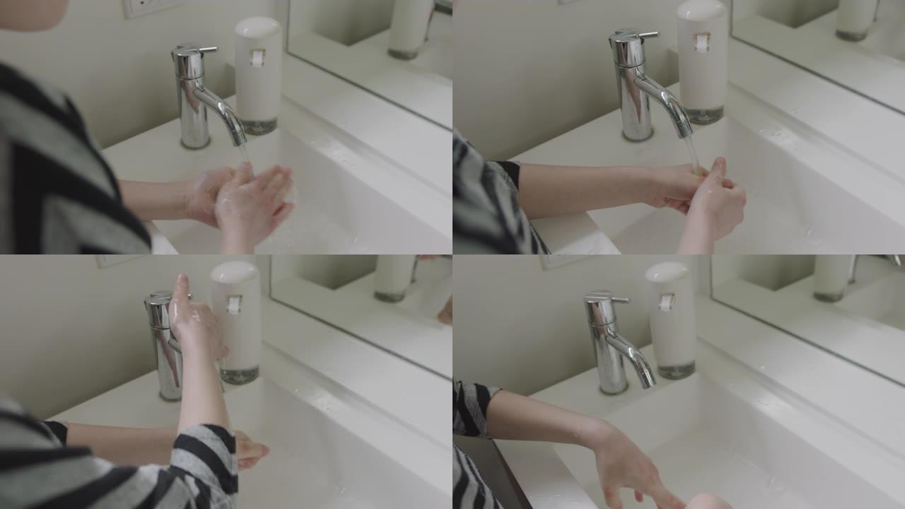 女孩彻底洗手以防止冠状病毒