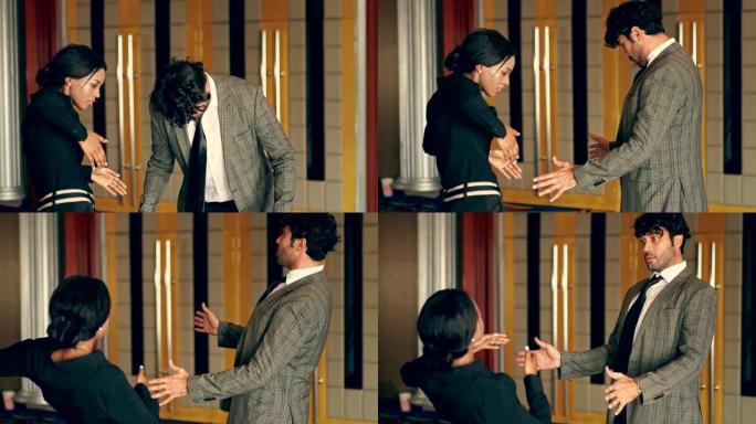 男人和女人像机器人一样快乐地一起跳舞。