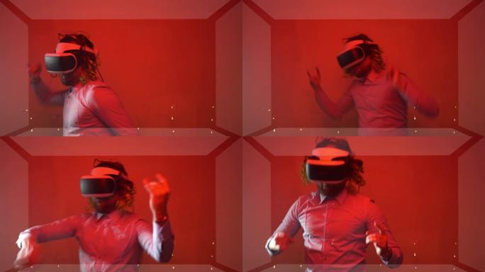 开朗的工程师在红色照明房间里玩得开心，测试虚拟现实眼镜，男人在增强现实中跳舞硬石。电子，VR眼镜和增